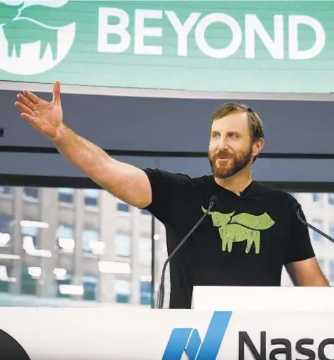  ?? DREW ANGERER/GETTY ?? Beyond Meat CEO Ethan Brown speaks before ringing the opening bell at Nasdaq MarketSite, May 2, 2019 in New York City. Valued at around $1.5 billion, Beyond Meat makes plant-based burgers and sausages.