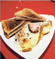  ?? CONTRIBUTE­D PHOTOS ?? The Black Forest ham and dill sauce omelette topped with cheese, served at Tea Tree Crêperie.
