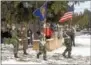  ??  ?? The Young Marine Color Guards of Lancaster bring the flags to the ceremony.