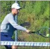  ??  ?? Oneida’s Scott Potter returns the ball during a third singles match.