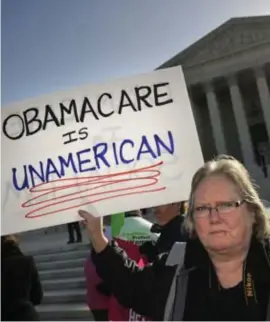  ?? © belga ?? Protest tegen de gezondheid­swet van Barack Obama.