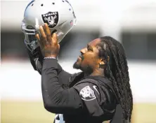  ?? D. Ross Cameron / Special to The Chronicle ?? Raiders running back Marshawn Lynch will suit up on Sunday against Miami after serving a one- game suspension.