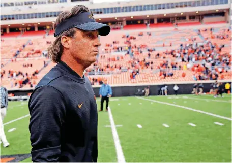  ?? [PHOTO BY SARAH PHIPPS, THE OKLAHOMAN] ?? In 2018, Mike Gundy steered Oklahoma State to a 3-0 start, but the Cowboys have lost three of their past four games.