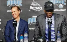  ?? STEPHEN M. DOWELL/ORLANDO SENTINEL/TNS ?? Center Mo Bamba, with Orlando Magic President Jeff Weltman at the Amway Center in Orlando, Fla., on June 22, was the sixth overall pick in the NBA draft.