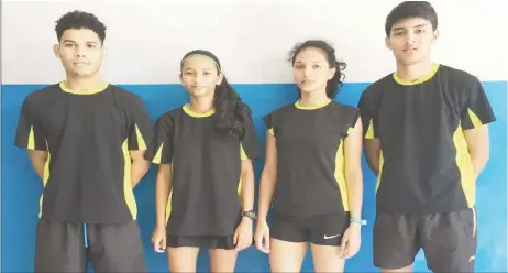  ??  ?? From left Jonathan Mangra, Priyanna Ramdhani, Ambika Ramraj and Narayan Ramdhani after they won a silver medal in the team event at the CAREBACO junior badminton championsh­ips in Aruba.