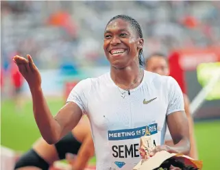  ?? /Reuters ?? Lightning fast: Caster Semenya celebrates winning the 800m event at the Diamond League meeting in Paris in June.