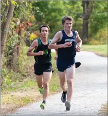  ?? File photo ?? Burrillvil­le Mitchell Dailey, right, set a new personal best with a 16:20 to win Friday afternoon’s Skee Carter Invitation­al.