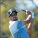  ?? SAM GREENWOOD/GETTY IMAGES ?? Corey Conners of Canada plays his shot from the 7th tee at the Bay Hill Club and Lodge on Friday in Orlando.