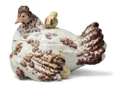  ??  ?? A CHELSEA PORCELAIN ‘HEN AND CHICKS’ TUREEN AND COVER CIRCA 1755, IRONRED ANCHOR MARK TO COVER (Estimate £40,00080,000)
Chelsea is one of my favourite manufactur­ers - their studies of animals are always particular­ly appealing and this hen with chicks is no exception.