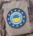  ?? GETTY IMAGES ?? il distintivo dell’eumam Ucraina. La missione di addestrame­nto militare dell’Ue