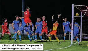  ?? Dave Crawford ?? Tavistock’s Warren Daw powers in a header against Saltash