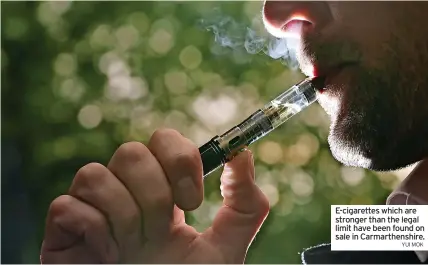  ?? YUI MOK ?? E-cigarettes which are stronger than the legal limit have been found on sale in Carmarthen­shire.