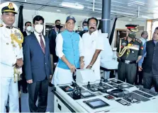  ??  ?? Defence Minister Rajnath Singh dedicates Indian Coast Guard ship Vigraha to the nation, in Chennai on Saturday. Also seen State Industries Minister Thangam Thennarasu, Army chief MM Naravane and ICG D-G K Natarajan