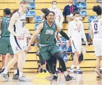  ?? STACY REVERE/GETTY ?? Ohio’s Miles Brown reacts to beating Virginia on Saturday at Assembly Hall in Bloomingto­n, Indiana.