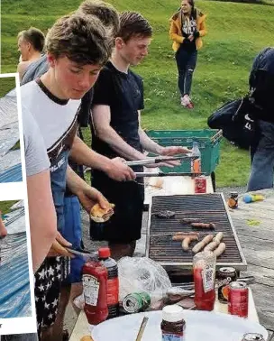  ??  ?? Grub up Head Boy Craig Fingland in charge of barbecue