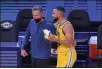  ?? JOSE CARLOS FAJARDO — BAY AREA NEWS GROUP FILE ?? Golden State Warriors head coach Steve Kerr celebrates with Stephen Curry after defeating the Sacramento Kings at Chase Center in San Francisco on Sunday, April 25.