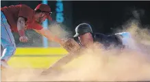  ?? JULIE JOCSAK TORSTAR ?? Brendon Dadson is safe at second in Intercount­y Baseball League action versus the Hamilton Cardinals on Thursday night in Welland.