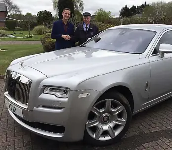  ??  ?? Silver machine: Boyd Tunnock with the Rolls-Royce Ghost in its original colour