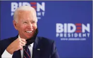  ?? Matt Slocum / Associated Press ?? Democrat Joe Biden defeated President Donald Trump to become the 46th president of the United States on Saturday, positionin­g himself to lead a nation gripped by historic pandemic and a confluence of economic and social turmoil.