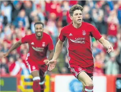  ?? Picture: SNS. ?? Ryan Christie celebrates after netting at Pittodrie last week.