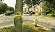  ?? AMY DAVIS/BALTIMORE SUN ?? The parking lot for the town houses in the 1400 block of Stoney Point Way stands cordoned off after police discovered an unresponsi­ve 15-year-old boy involved in a custody dispute in July 2021. The boy’s stepfather, suspended Baltimore City Police officer Eric Glenn Banks Jr., was sentenced to 42 years in prison Friday.