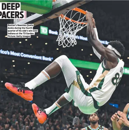  ?? ?? Boston’s Neemias Queta dunks during the fourth quarter of his side’s win over Indiana at the TD Garden. Picture: Getty Images