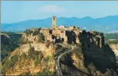  ?? PROVIDED TO CHINA DAILY ?? The hilltop village of Civita di Bagnoregio in central Italy has become a popular holiday destinatio­n.