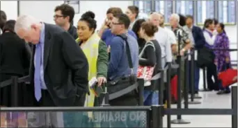  ?? AP FILE PHOTO/WILFREDO LEE ?? Air travelers can expect lines like this one, AAA Mid-Atlantic Thanksgivi­ng holiday travel report. says in its annual