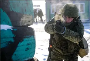  ?? (AP) ?? A Russian soldier takes part in drills Wednesday at the Kadamovski­y firing range in the Rostov region in southern Russia. Video online at arkansason­line.com/1223putin/.