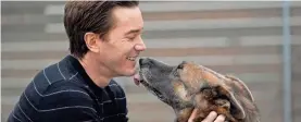  ?? ERIC GAY/AP ?? Actor Tom Pelphrey poses with his dog Blue at his home in Austin, Texas. Pelphrey is no longer on the show “Ozark,” but his character has made a lasting imprint.