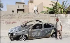  ??  ?? سيارة مدمرة بعد هجوم بقنبلة في كركوك أمس الأول
(رويترز)