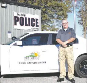  ?? (NWA Democrat-Gazette/Annette Beard) ?? Tom O’Neal recently joined the city staff as code enforcemen­t officer. An employee of the city, he will work under the direction of Police Department Lt. John Langham and will assist with animal
control and code enforcemen­t.