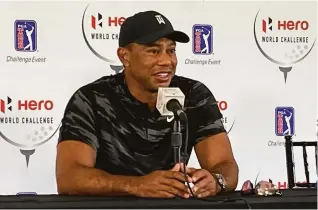  ?? Doug Ferguson / Associated Press ?? Tiger Woods holds his first news conference since his Feb. 23 car crash in Los Angeles at the Hero World Challenge golf tournament in Nassau, Bahamas.