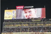  ?? GREGORY PAYAN
ASSOCIATED PRESS ?? Denver Broncos quar terback Peyton Manning is seen on the scoreboard af ter the NFL Super Bowl 50 football game on Sunday. “I’m going to drink a lot of Budweiser, Tracy, I promise you that,” Manning told a repor ter af ter winning the game.