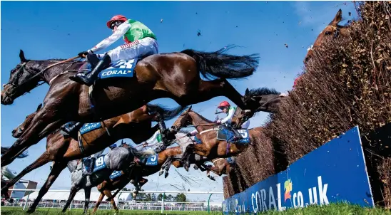  ?? Photograph: PA ?? Vicente and Sam Twiston-Davies on their way to winning yesterday’s Scottish Grand National at Ayr