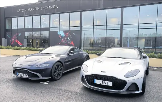  ?? REUTERS ?? Aston Martin Lagonda cars are seen parked outside the new factory at St Athan, Wales on December 6, 2019.