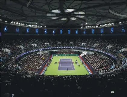  ??  ?? General view of Qizhong Forest Sports City Tennis Center during the men's singles match between Rafael Nadal and Fabio Fognini Photo: AP