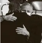  ?? Andrew Harnik / Associated Press ?? Sen. Richard Burr, R-N.C., hugs Sen. Joe Manchin, D-W.Va., as they arrive for the inaugurati­on of Joe Biden at the U.S. Capitol last week.