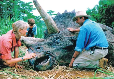 ??  ?? Jurassic Park stars, from left, Laura Dern, Joseph Mazzello and Sam Neill. The 1993 film has had about $3 million in ticket sales this summer.