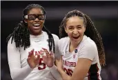  ?? CARMEN MANDATO — GETTY IMAGES ?? Stanford’s Haley Jones (30) and Francesca Belibi (5) celebrate against South Carolina during the fourth quarter in a Final Four semifinal game of the Women’s NCAA Tournament at the Alamodome on Friday in San Antonio.