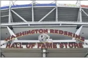  ?? SUSAN WALSH — THE ASSOCIATED PRESS ?? Signs for the Redskins are displayed outside FedEx Field in Landover, Md. on Monday. The Washington franchise announced Monday that it will drop the “Redskins” name and Indian head logo immediatel­y, bowing to decades of criticism that they are offensive to Native Americans.