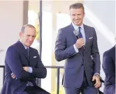  ?? LYNNE SLADKY/AP FILE ?? Former standout David Beckham, right, shown with MLS Commission­er Don Garber, is leading Miami’s bid to gain an expansion franchise.