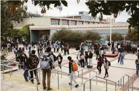  ?? Brontë Wittpenn / The Chronicle ?? Students gather in the courtyard of Lowell High School in S.F. last month as classes let out for the day. Infection rates remain low in the city’s schools.