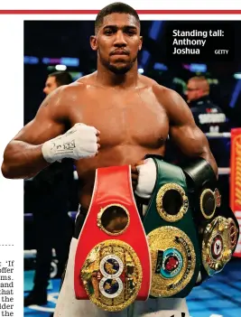  ?? GETTY ?? Standing tall: Anthony Joshua