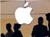  ??  ?? Customers enter the Apple store in May 31 in New York. Wall Street has suddenly soured on Silicon Valley and the rest of tech, triggering a downturn likely to leave millions queasy, should they check the damage to their investment portfolios in October.