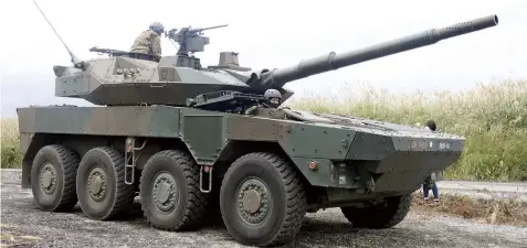  ?? The Yomiuri Shimbun ?? A Type 16 mobile combat vehicle
