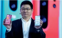  ?? — AFP ?? huawei Consumer Products division CEo richard Yu presenting the new P30 smartphone in Paris on tuesday.