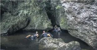  ??  ?? Underworld rafting is a family friendly activity in the Paparoa national park.