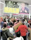  ?? Picture: ESA ALEXANDER ?? IN THE BALANCE: In previous years, shoppers have been keen to take advantage of Black Friday specials.