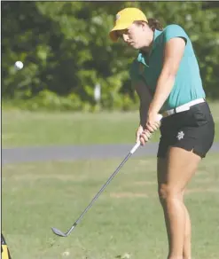  ?? The Sentinel-Record/Richard Rasmussen ?? LEADING THE WAY: Arkansas Tech University golfer Avery Struck chips onto the second green on the Park Course during the GAC women’s golf championsh­ip at Hot Springs Country Club Monday.